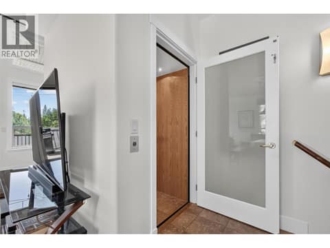 Elevator access to every level! at 3359 Cougar Road Unit# 9, Westbank Centre, West Kelowna
