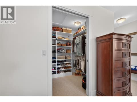 Large walk-in closet at 3359 Cougar Road Unit# 9, Westbank Centre, West Kelowna