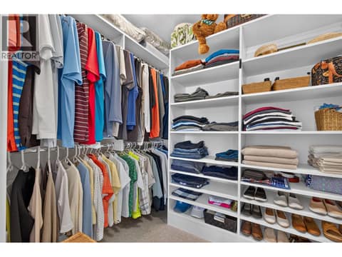 Large walk-in closet at 3359 Cougar Road Unit# 9, Westbank Centre, West Kelowna