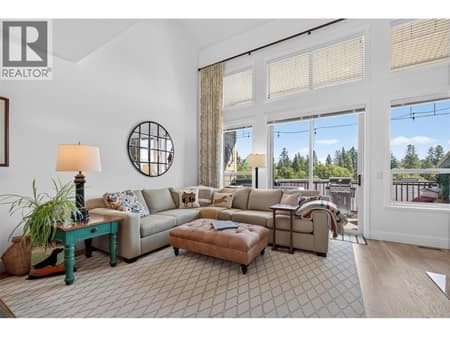 Living space with access to the patio at 3359 Cougar Road Unit# 9, Westbank Centre, West Kelowna