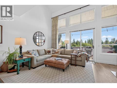 Living space with access to the patio at 3359 Cougar Road Unit# 9, Westbank Centre, West Kelowna