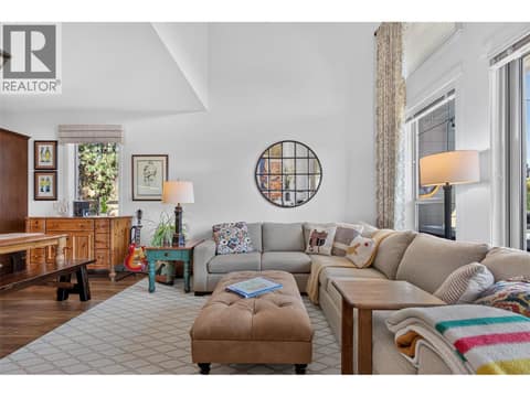 Open living space with elevated ceilings at 3359 Cougar Road Unit# 9, Westbank Centre, West Kelowna
