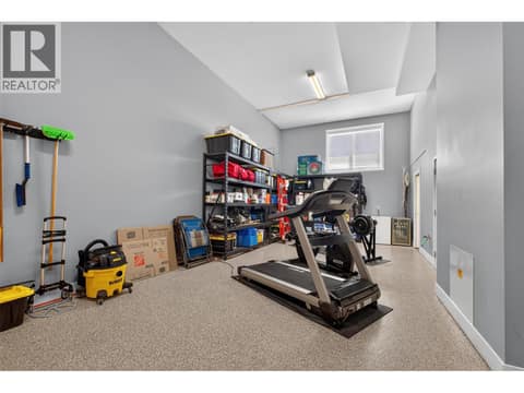 Plenty of room to use as storage, secure parking at 3359 Cougar Road Unit# 9, Westbank Centre, West Kelowna