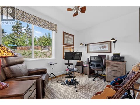 Secondary bedroom at 3359 Cougar Road Unit# 9, Westbank Centre, West Kelowna