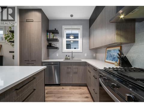 Ceiling height cabinetry provides lots of cupboard space at 805 Burne Avenue Unit# 4, Kelowna South