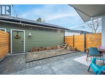 Fully fenced & PRIVATE yard with access to the single garage & gas BBQ hook up! Use your creativity here! at 805 Burne Avenue Unit# 4, Kelowna South