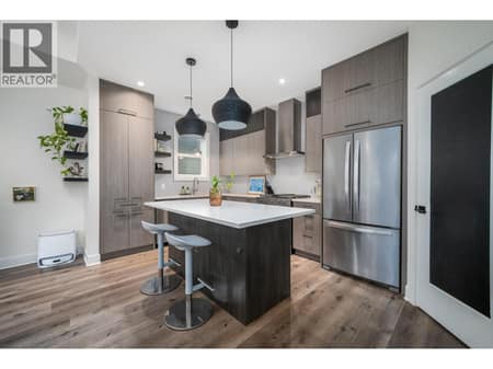 Stunning chef inspired kitchen with quartz countertops! at 805 Burne Avenue Unit# 4, Kelowna South
