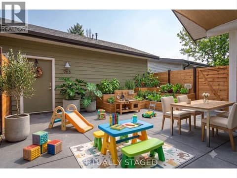 Virtually Staged - Make it a fun play area with raised garden beds! So many options! at 805 Burne Avenue Unit# 4, Kelowna South