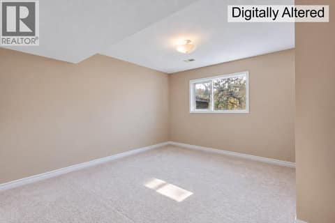 Lower Bedroom at 2335 Somerset Court Lot# 3, West Kelowna Estates