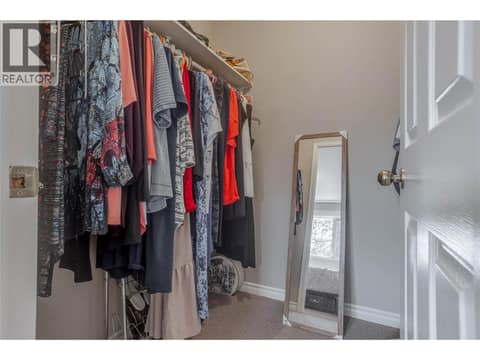 Walk in Closet in Primary Bedroom at 2335 Somerset Court Lot# 3, West Kelowna Estates