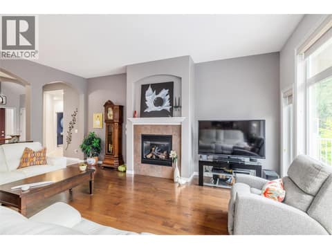 Living Room featuring gas fireplace at 4170 Gallaghers Forest South, South East Kelowna