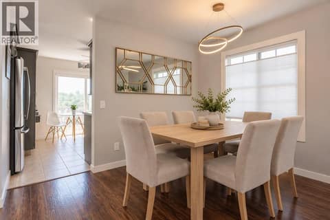 AI generated photo showing lighter furniture in the space at 2440 Old Okanagan Highway Unit# 1114, Westbank Centre, West Kelowna