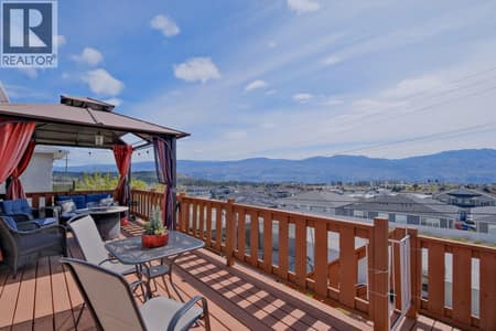 Beautiful sundeck off the kitchen with lake and city views. at 2440 Old Okanagan Highway Unit# 1114, Westbank Centre, West Kelowna