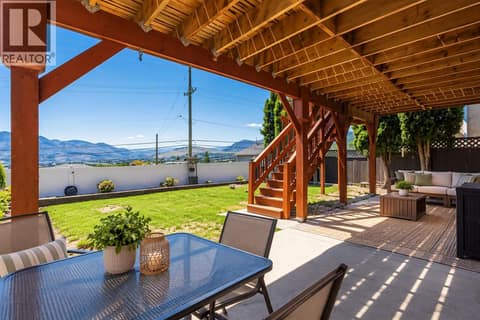 ***Furniture in the photo has been AI generated to show a cozy patio set up. at 2440 Old Okanagan Highway Unit# 1114, Westbank Centre, West Kelowna