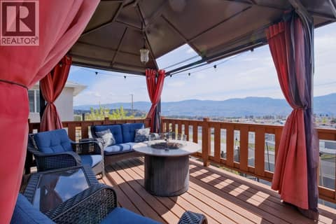 Lake and city views off the upper deck. at 2440 Old Okanagan Highway Unit# 1114, Westbank Centre, West Kelowna