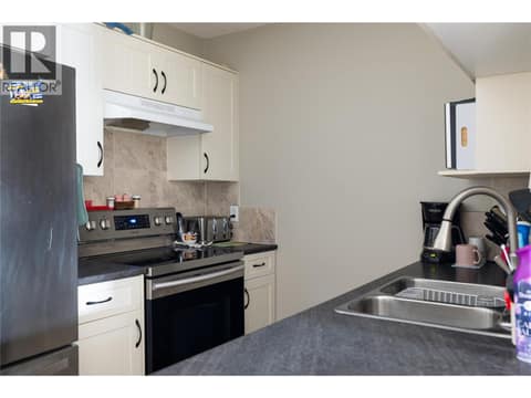 Functional kitchen, stainless appliances at 2985 Smith Drive Unit# 207, Armstrong/ Spall.