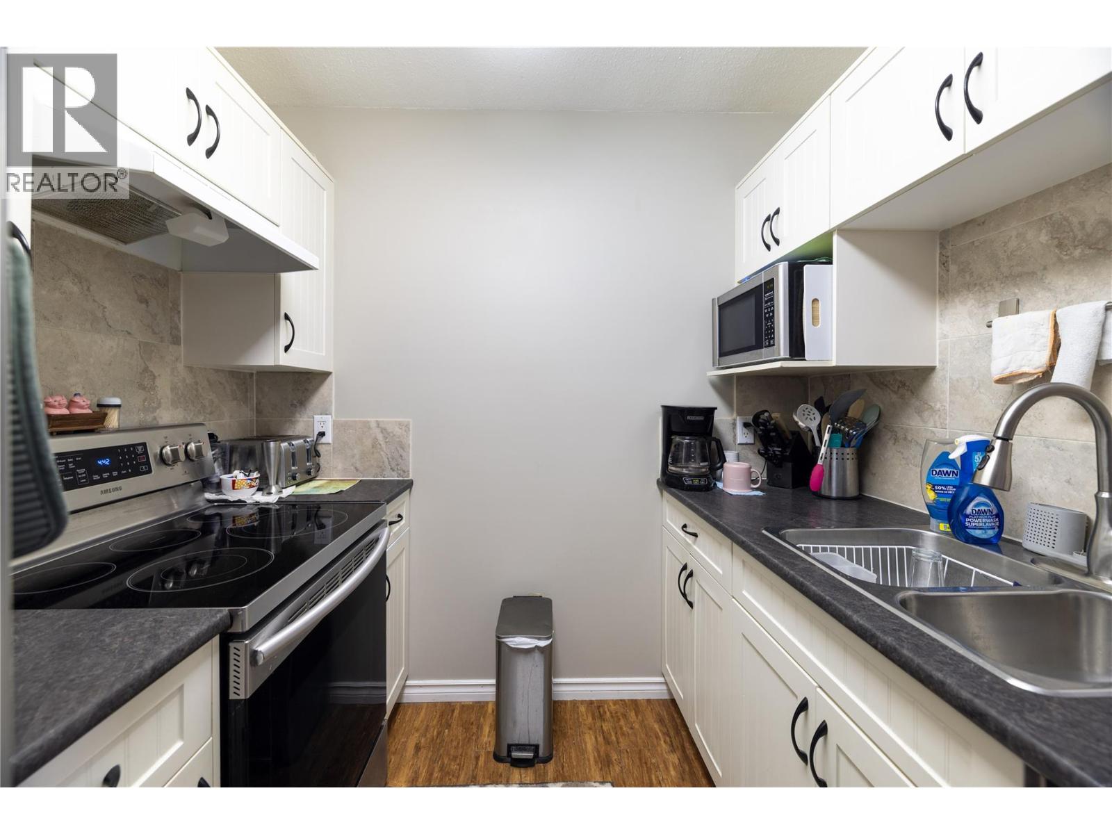 Galley kitchen at 2985 Smith Drive Unit# 207, Armstrong/ Spall.