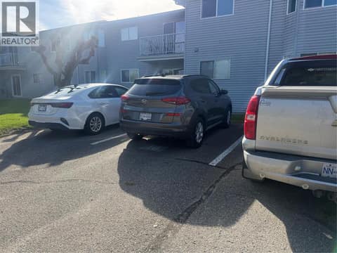 Parking stall 18 at 2985 Smith Drive Unit# 207, Armstrong/ Spall.