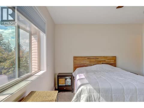 Primary bedroom at 3600 Pleasant Valley Road Unit# 3, East Hill, Vernon