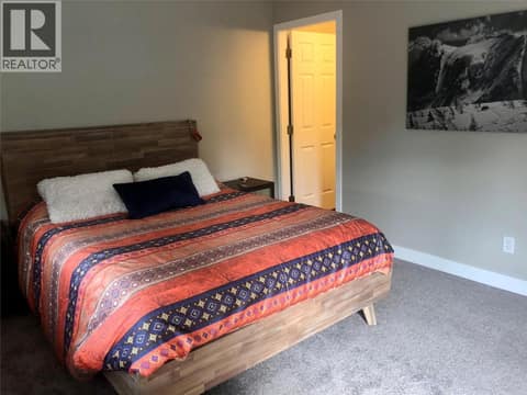 Primary bedroom, Photo supplied by owner. at 3600 Pleasant Valley Road Unit# 3, East Hill, Vernon