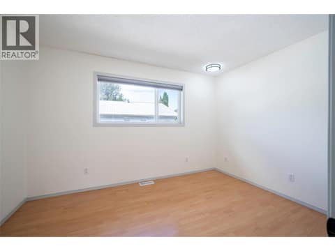 Main bedroom at 4100 19 Street Unit# A & B Lot# 4, Harwood, Vernon