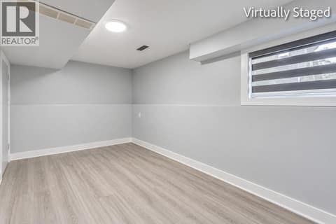 In Law Suite Living Room *Virtually Staged* at 465 - 467 Killarney Road, Rutland North, Kelowna