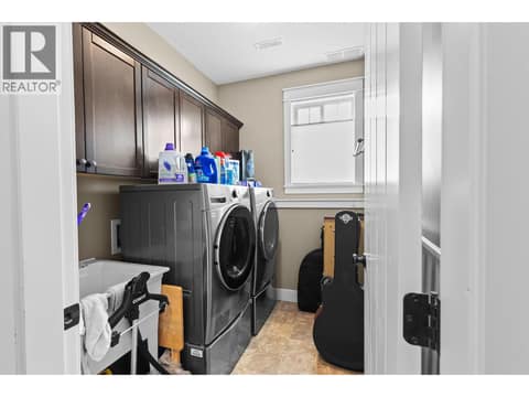 Laundry Lower floor at 6555 Blackcomb Place, Foothills, Vernon