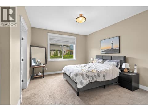 Primary Bedroom at 6555 Blackcomb Place, Foothills, Vernon