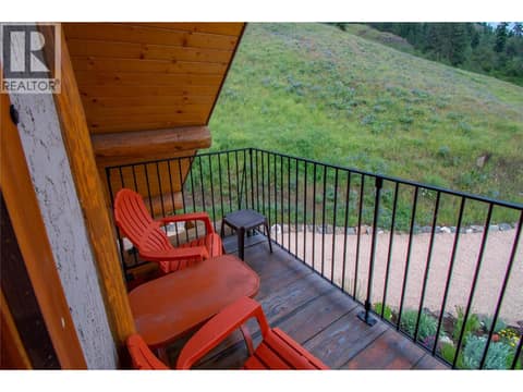 Balcony off of Second Bedroom, perfect to enjoy the morning's songbirds! at 1225 Round Lake Road, Armstrong/ Spall.