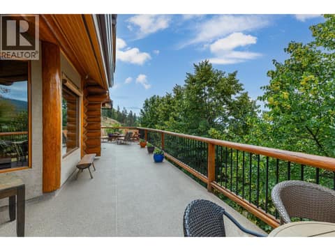 Fabulous Deck includes log railings at 1225 Round Lake Road, Armstrong/ Spall.
