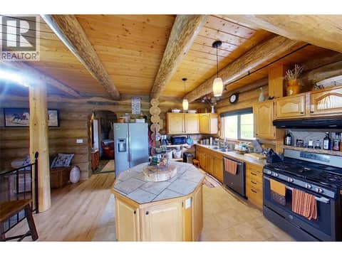 Kitchen - beautiful Logs & home! at 1225 Round Lake Road, Armstrong/ Spall.