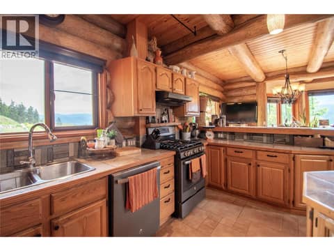 Lots of natural light and views while you clean the pots & pans! at 1225 Round Lake Road, Armstrong/ Spall.
