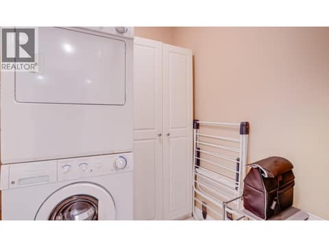Laundry room and storage space at 3211 Centennial Drive Unit# 28, Alexis Park, Vernon