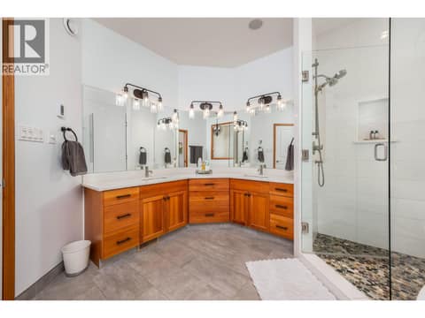 Double vanity with newer granite countertops at 100 Kestrel Place Unit# 11, Adventure Bay, Vernon