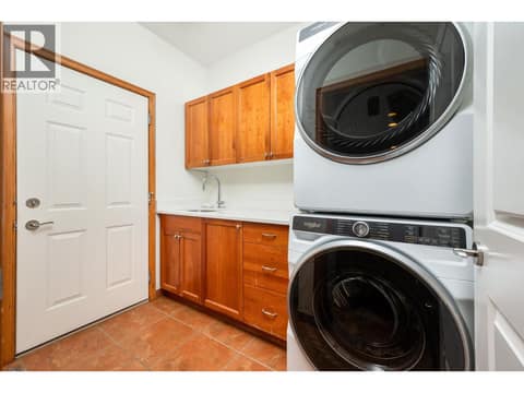 Laundry off garage entry at 100 Kestrel Place Unit# 11, Adventure Bay, Vernon