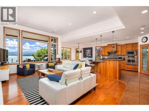 Open family, kitchen and dining area at 100 Kestrel Place Unit# 11, Adventure Bay, Vernon