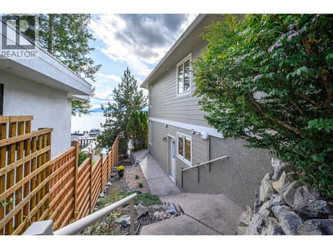 Walking path, entry door to utility room. at 100 Kestrel Place Unit# 11, Adventure Bay, Vernon