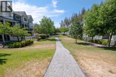 Beautiful landscaping throughout the strata with walking paths and access to the surrounding trails at 2490 Tuscany Drive Unit# 82, Shannon Lake, West Kelowna