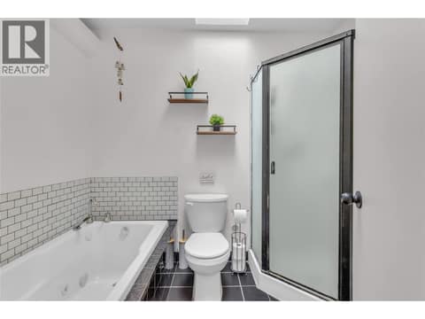 Full bath on main level with 3 bedrooms at 3227 McIver Road, Glenrosa, West Kelowna