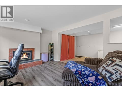 Gas fireplace lower level at 3227 McIver Road, Glenrosa, West Kelowna