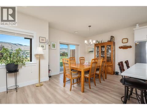 Dining area with walk out to patio at 6600 Okanagan Avenue Unit# 38, Okanagan Landing, Vernon