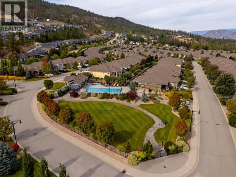 Cadence offers a seasonal outdoor pool and hot tub, with change rooms. at 13155 Staccato Drive, Lake Country North West