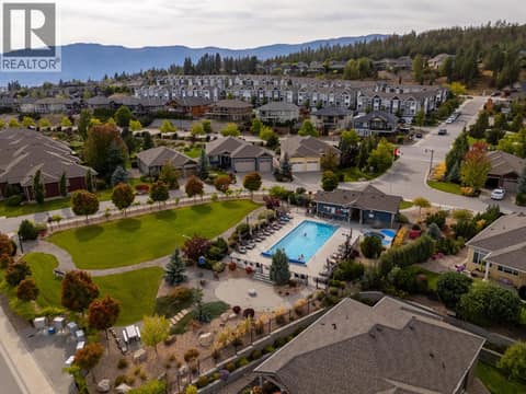 Cadence offers a seasonal outdoor pool and hot tub, with change rooms. at 13155 Staccato Drive, Lake Country North West
