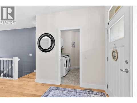 Laundry off front entry at 13155 Staccato Drive, Lake Country North West