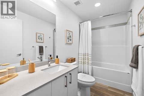 Bathroom. Photos are of a similar home; some features may vary at 1111 Frost Road Unit# 403, Upper Mission, Kelowna