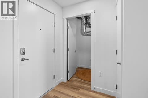 Foyer and Laundry Room. Photos are of a similar home; some features may vary at 1111 Frost Road Unit# 403, Upper Mission, Kelowna