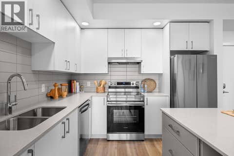 Kitchen. Photos are of a similar home; some features may vary at 1111 Frost Road Unit# 403, Upper Mission, Kelowna