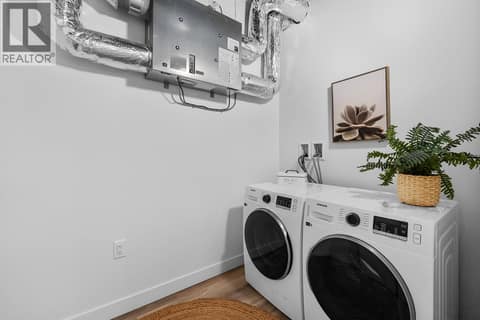 Laundry Room. Photos are of a similar home; some features may vary at 1111 Frost Road Unit# 403, Upper Mission, Kelowna