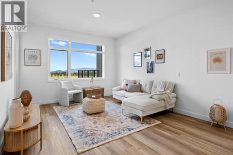 Living Room. Photos are of a similar home; some features may vary at 1111 Frost Road Unit# 403, Upper Mission, Kelowna