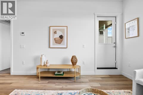 Living Room. Photos are of a similar home; some features may vary at 1111 Frost Road Unit# 403, Upper Mission, Kelowna